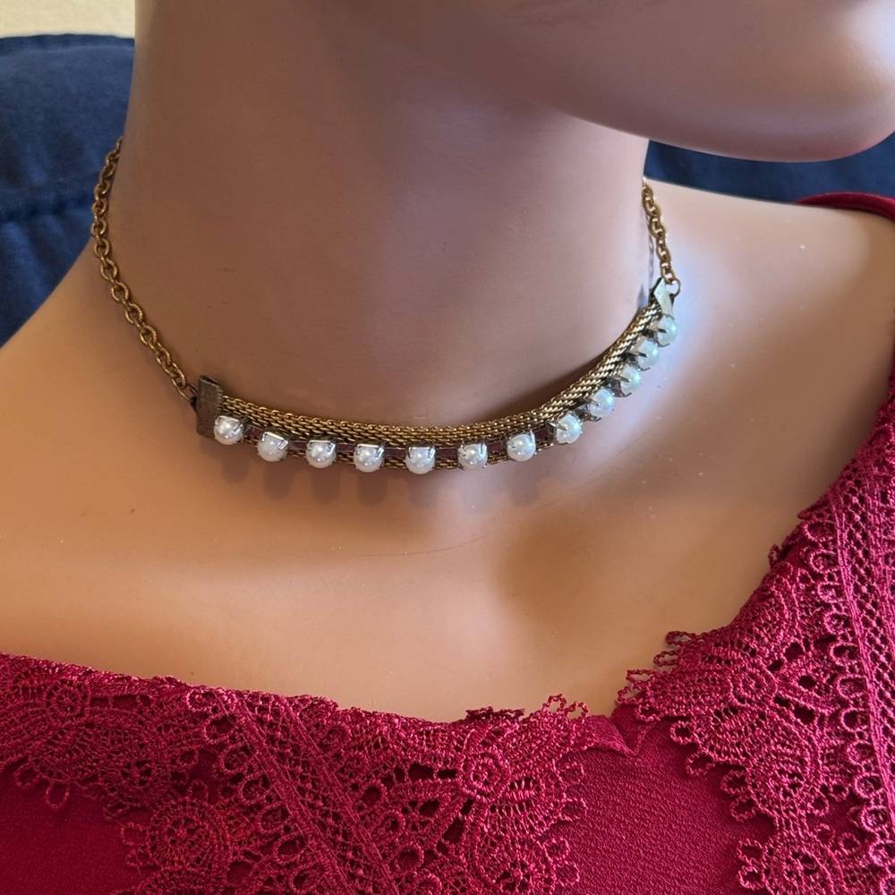 Vintage gold tone chain choker necklace with a bar setting of faux white pearls